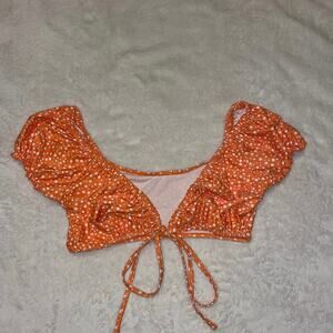 Sexy flirty bikini ruffle top orange white polka dot with middle tie. Size small
